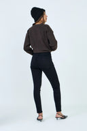 Pantalon slim push-up noir pour femme de la marque ANA & LUCY, vue de dos.